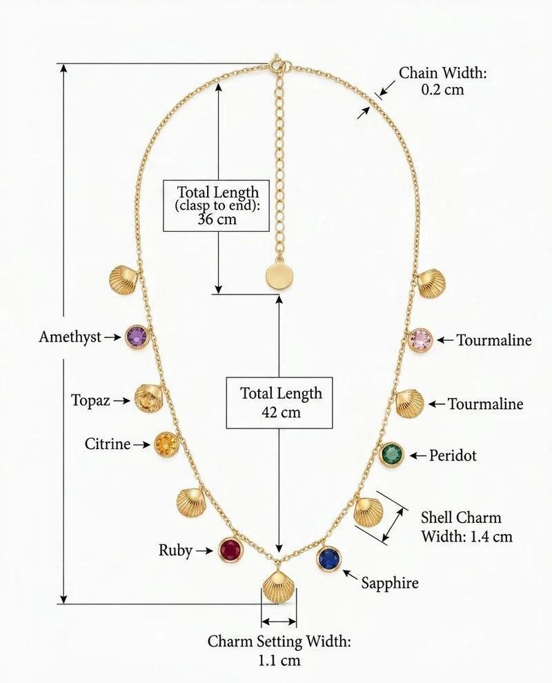 A necklace charm set with labeled dimensions and gemstone names on a plain light background. The product appears to be a gold-tone chain necklace with multiple dangling charms, including shell-shaped charms and round charms, with arrows and text showing measurements such as chain width 0.