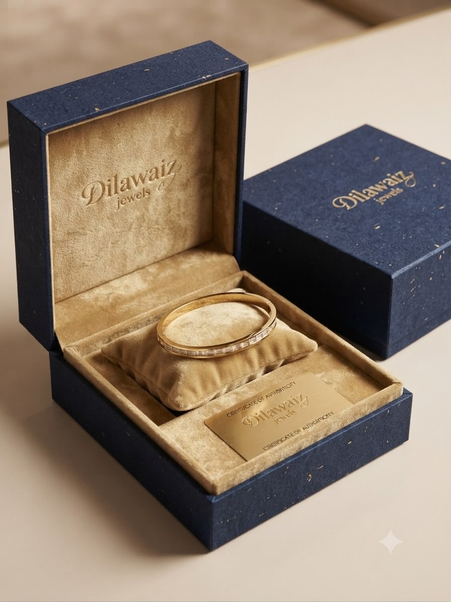 A gold ring displayed on a beige velvet ring cushion inside an open navy blue jewelry box with the brand name 'Dilawaiz jewelry' embossed on the lid and box. A second closed navy blue box sits behind it on a neutral beige surface.